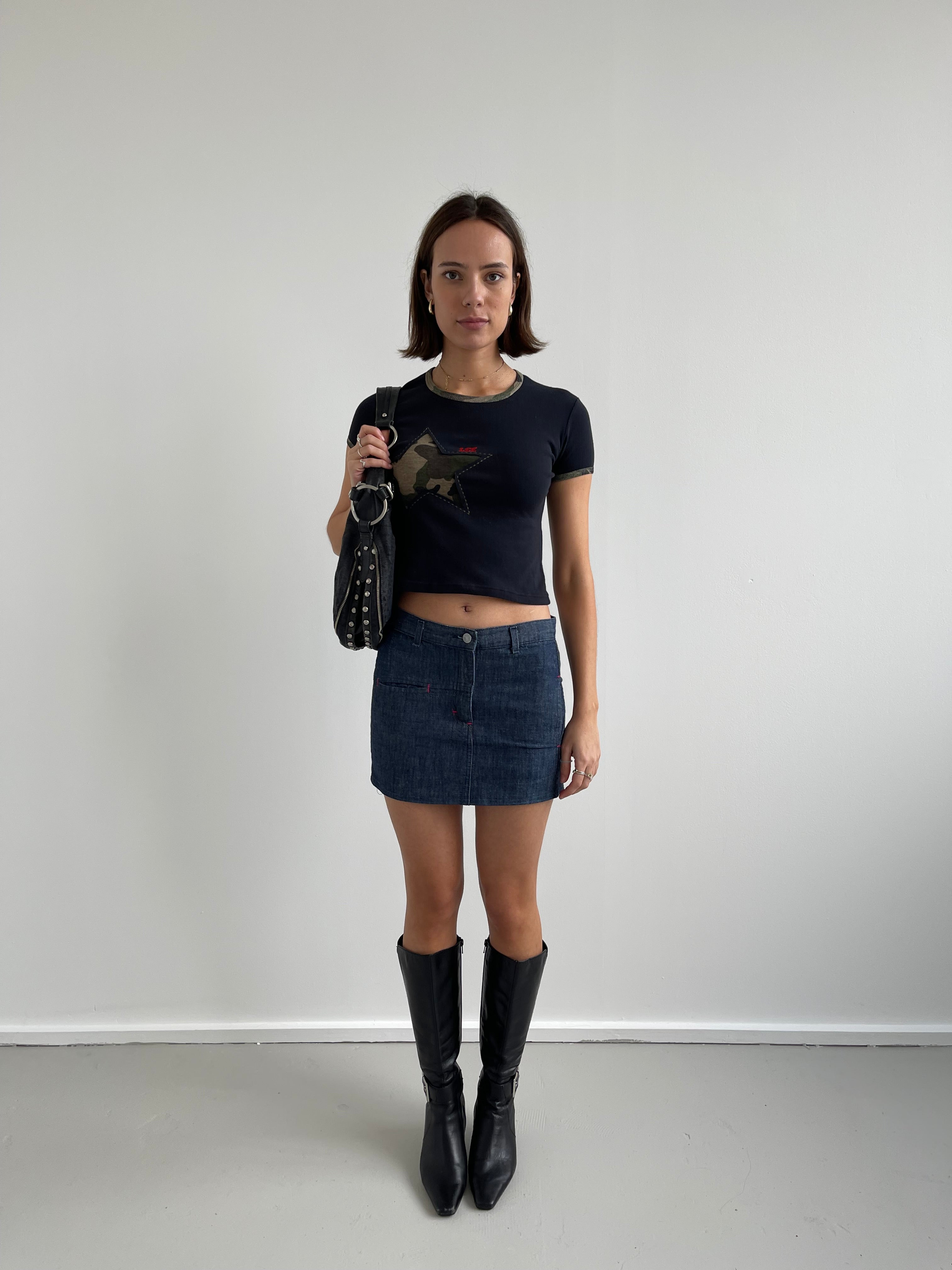 Denim mini skirt with pink top stitching detail