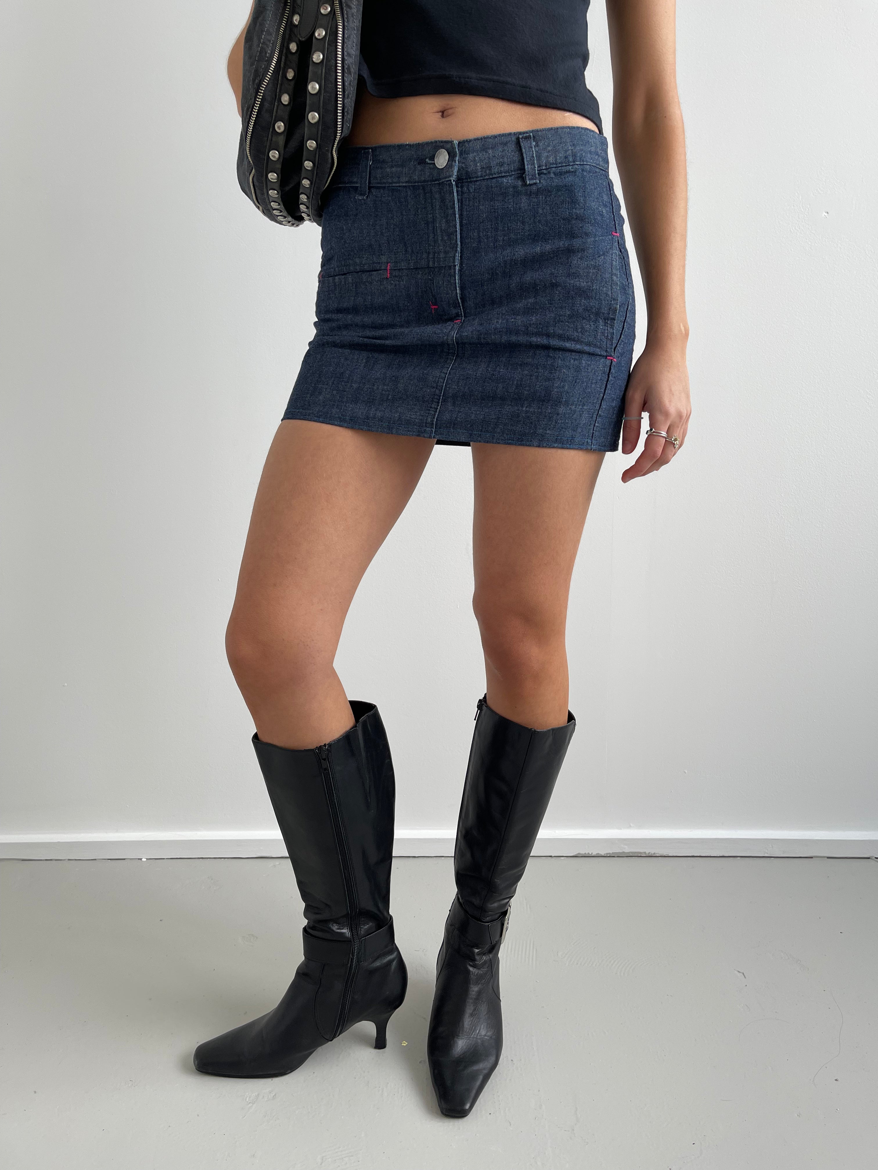 Denim mini skirt with pink top stitching detail