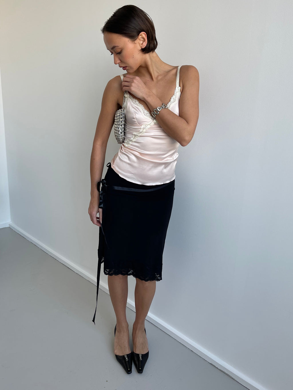 Peg black slinky skirt with lace trim