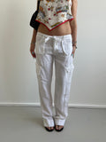 White linen trousers with belt and cargo style pockets
