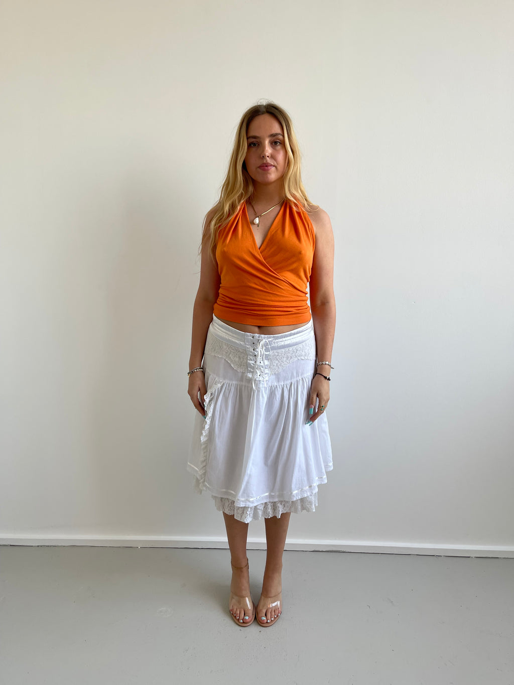 Orange plunge halter top