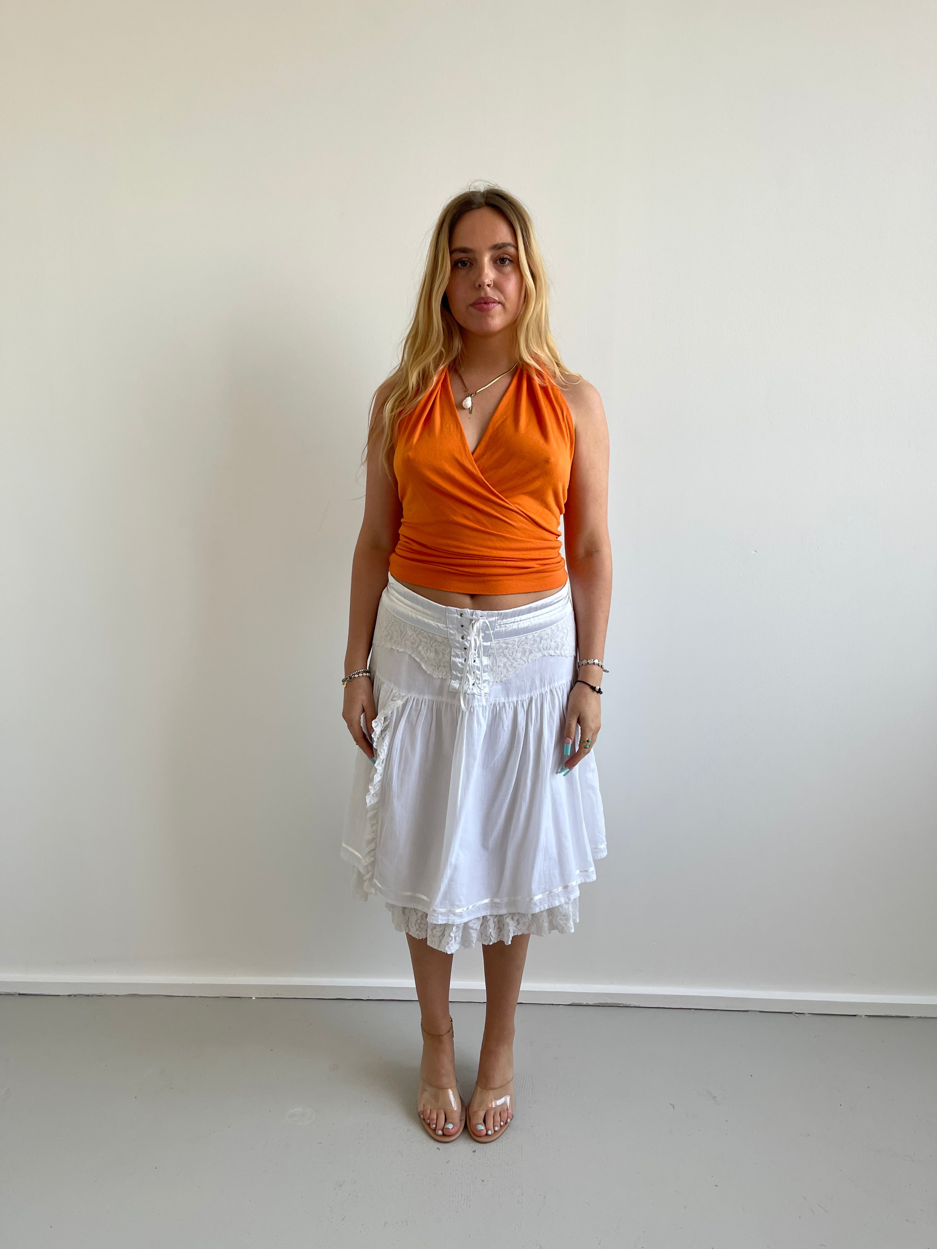Orange plunge halter top