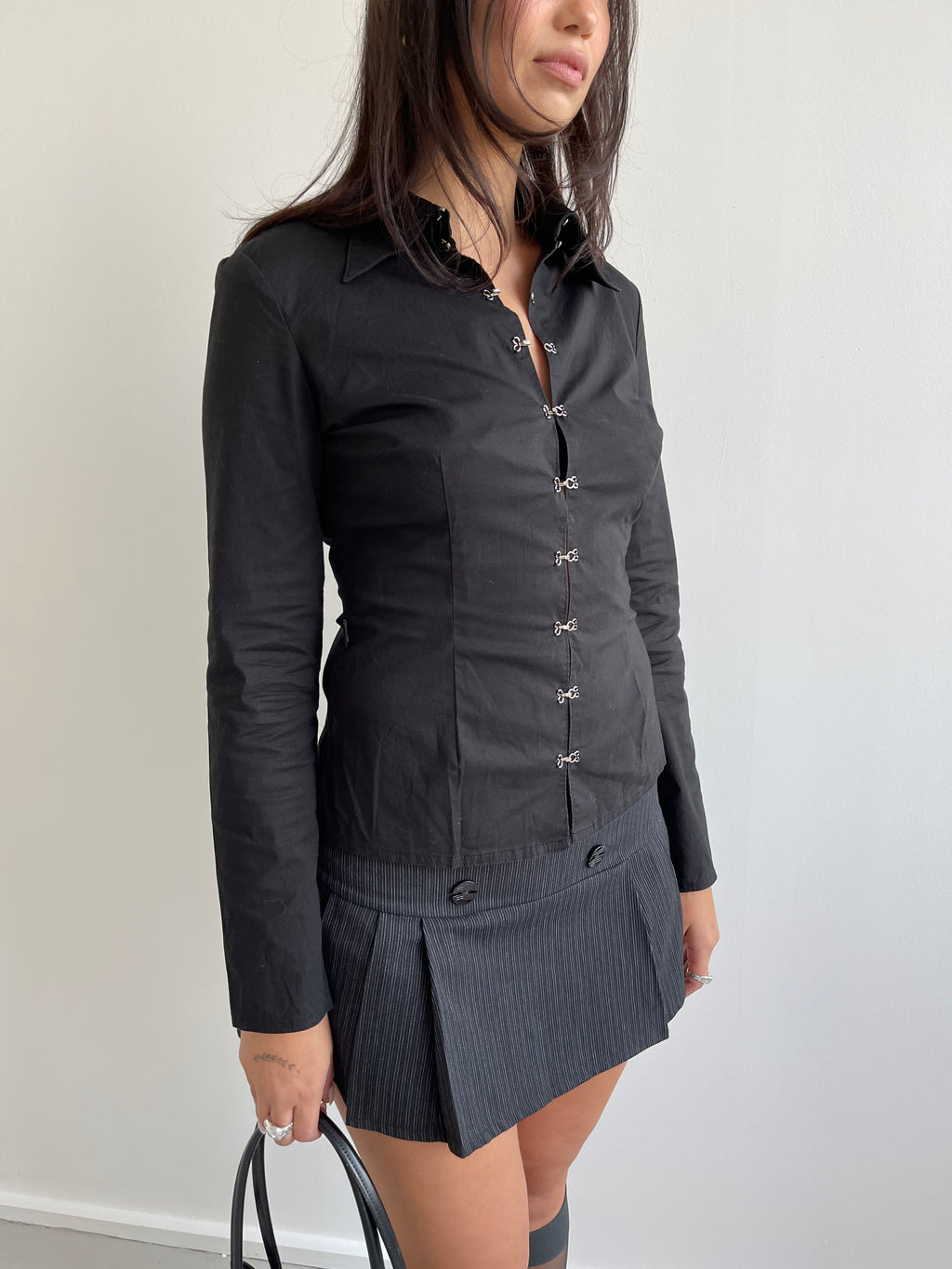 Black pleated mini skirt with grey pinstripe