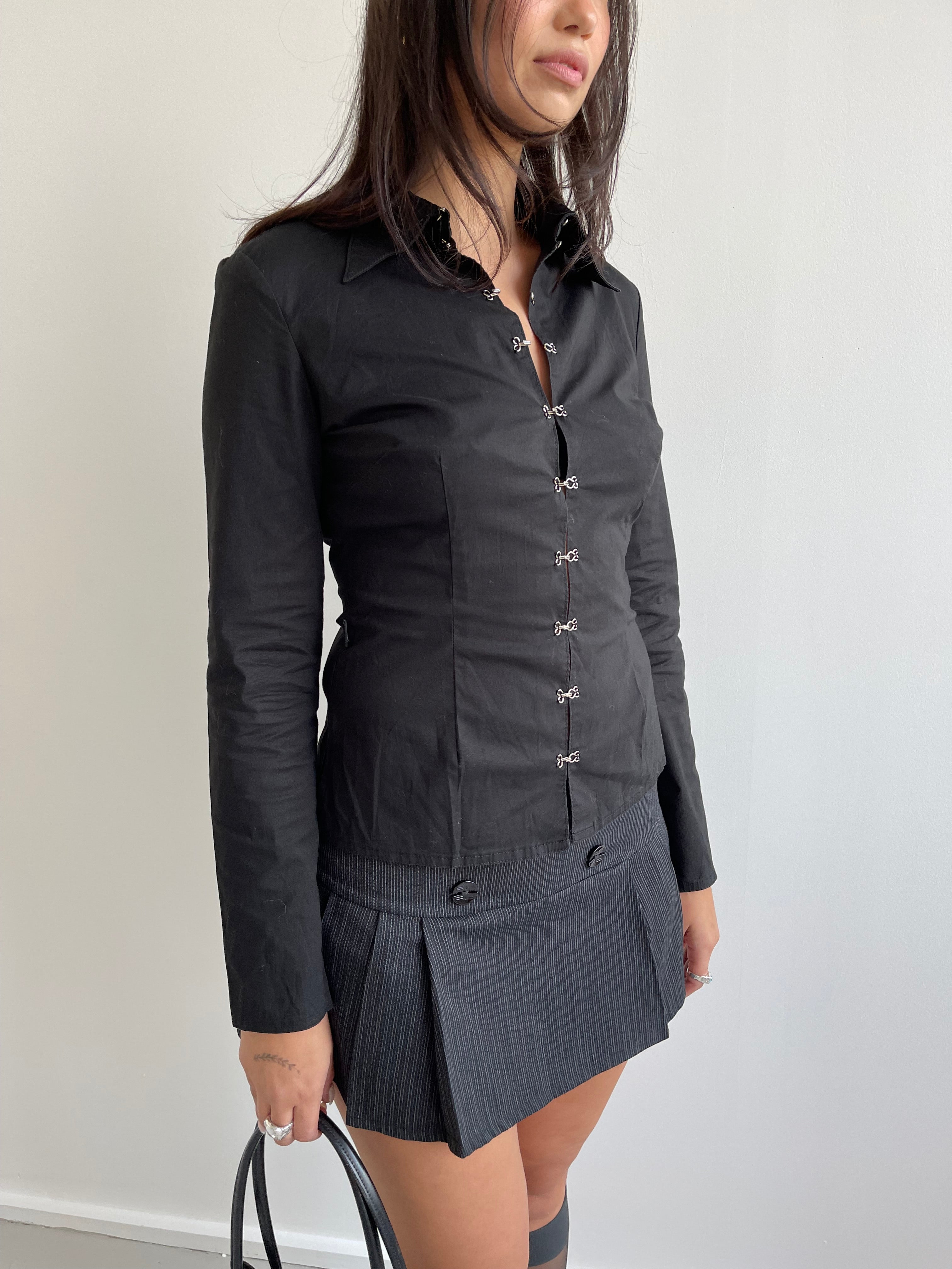 Black pleated mini skirt with grey pinstripe