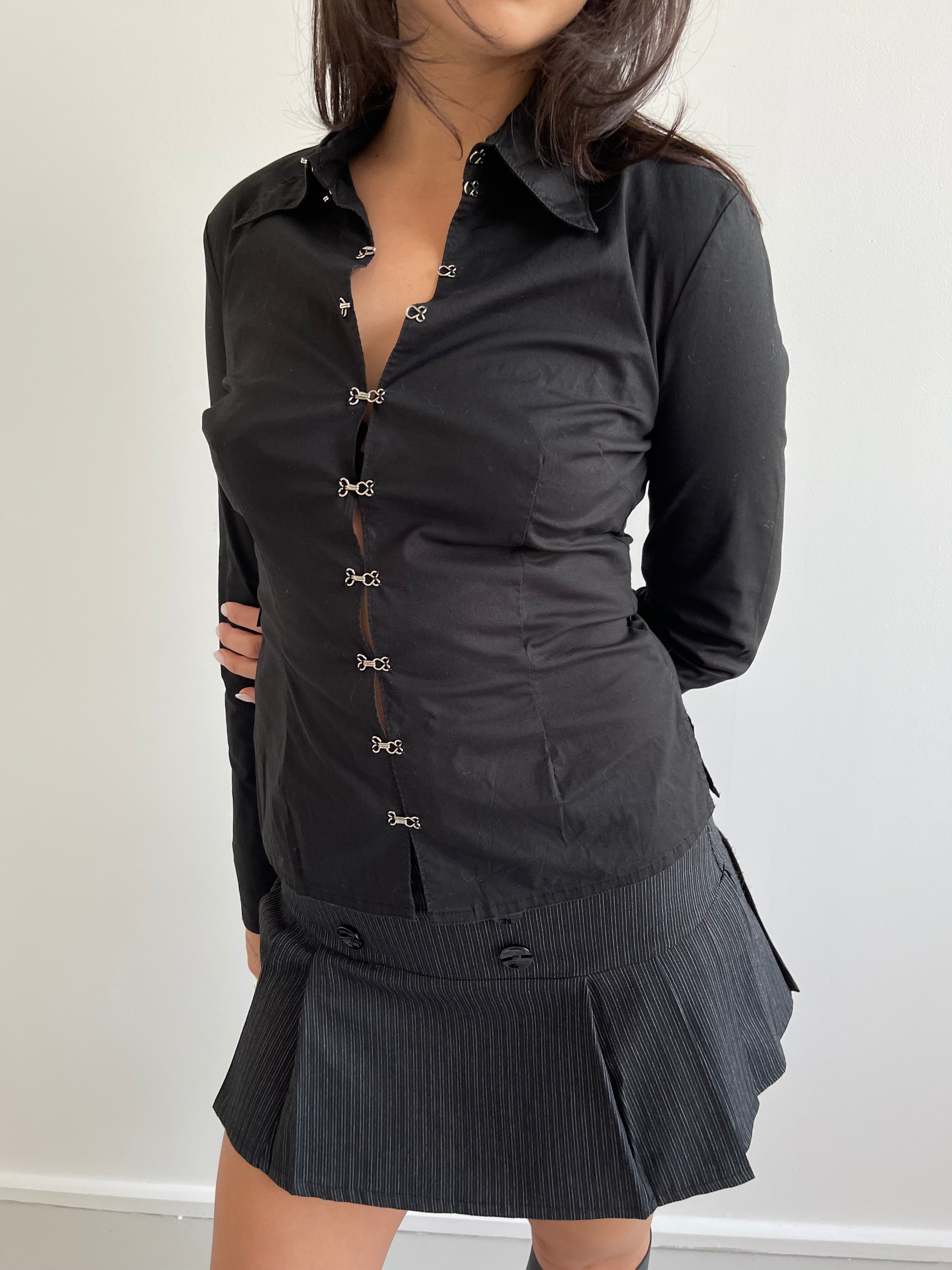 Black pleated mini skirt with grey pinstripe