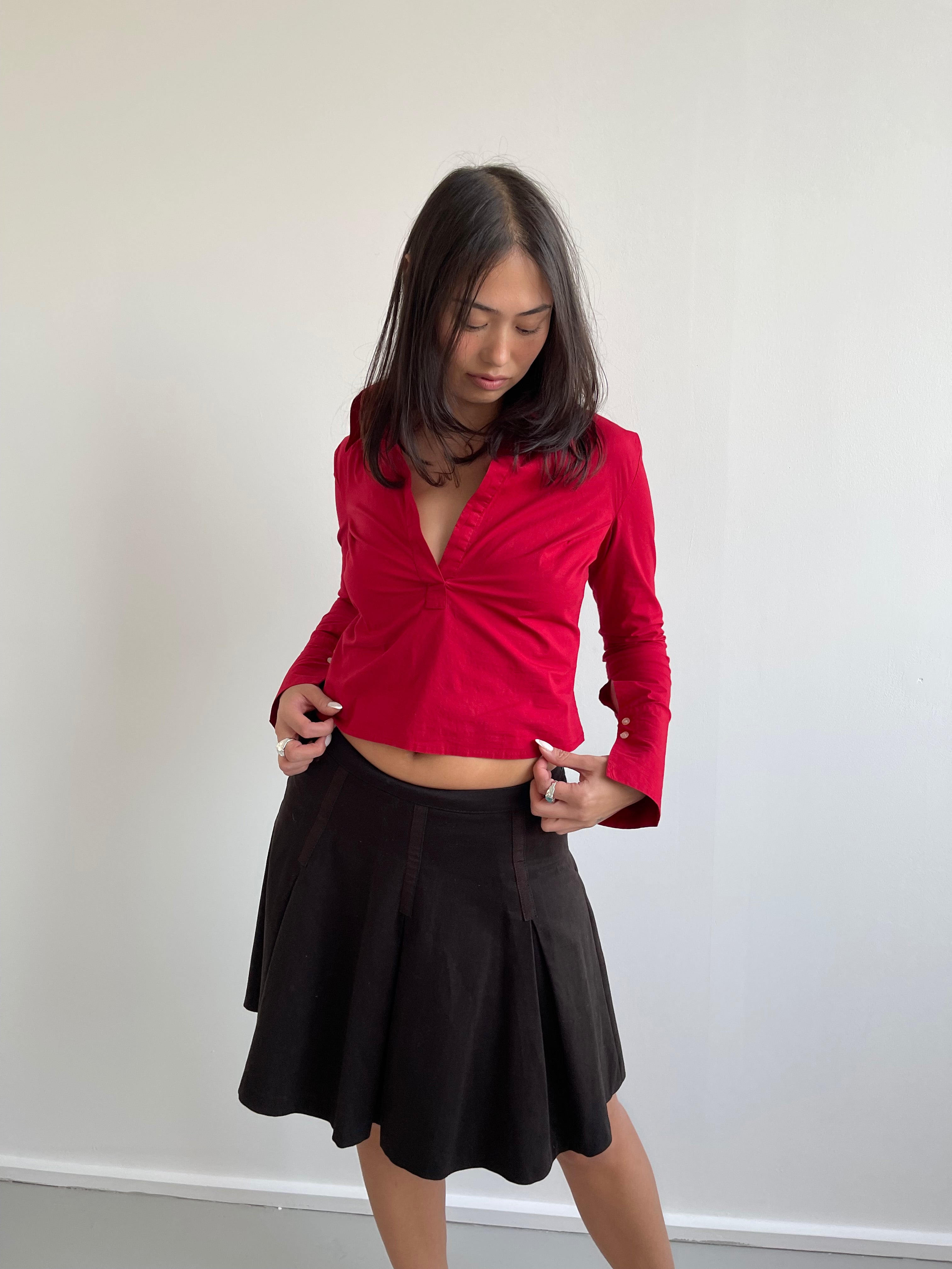 Red pull over shirt