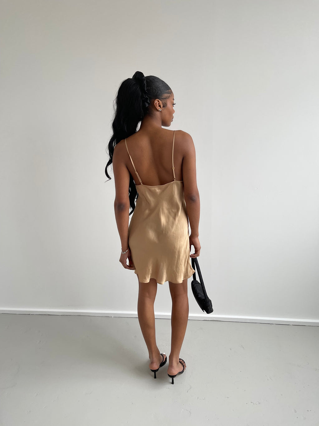 Gold satin slip dress with black lace detail