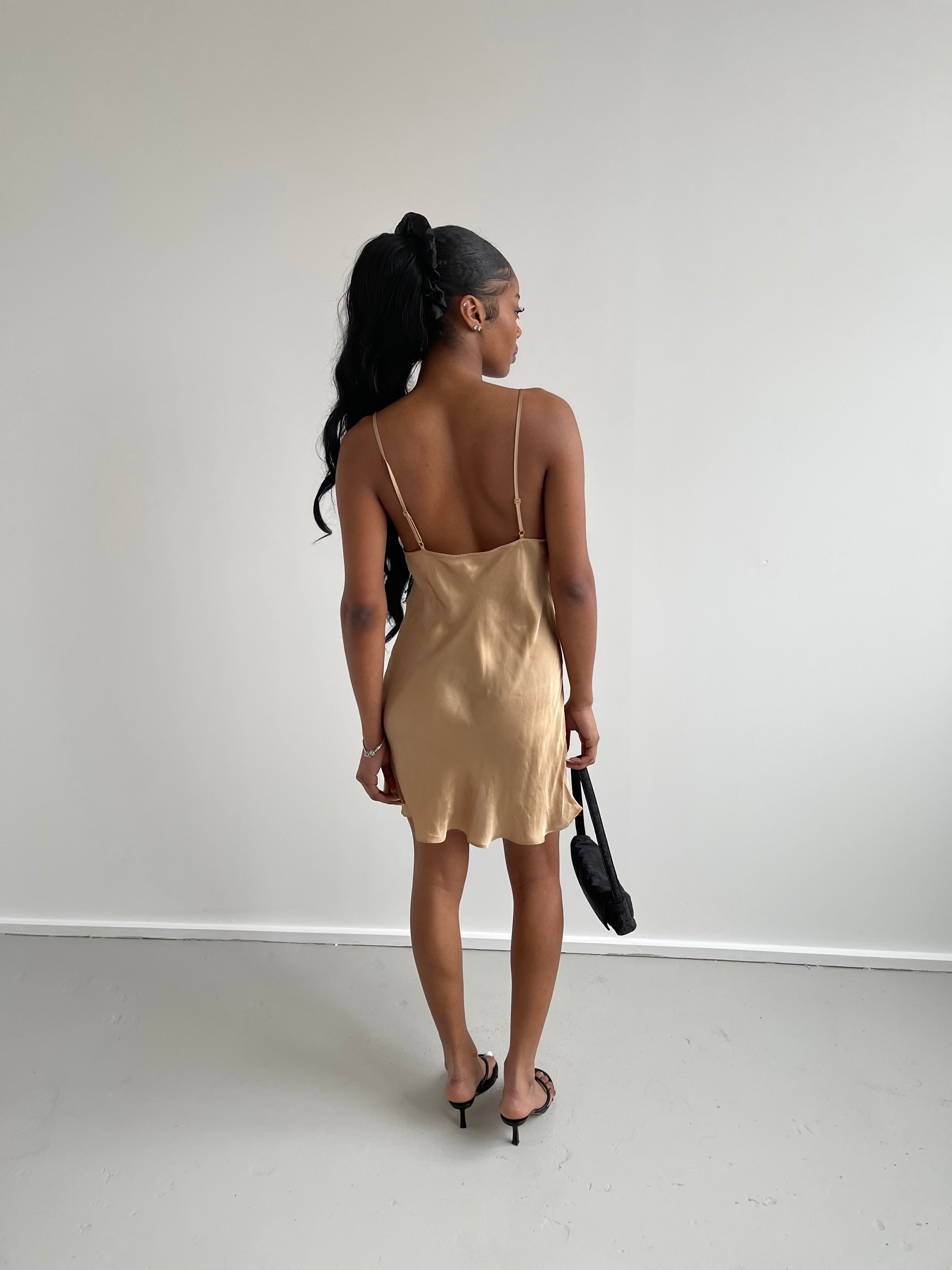 Gold satin slip dress with black lace detail