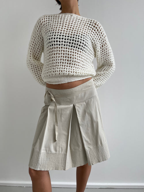 Beige pleated knee length shirt with top stitch trims