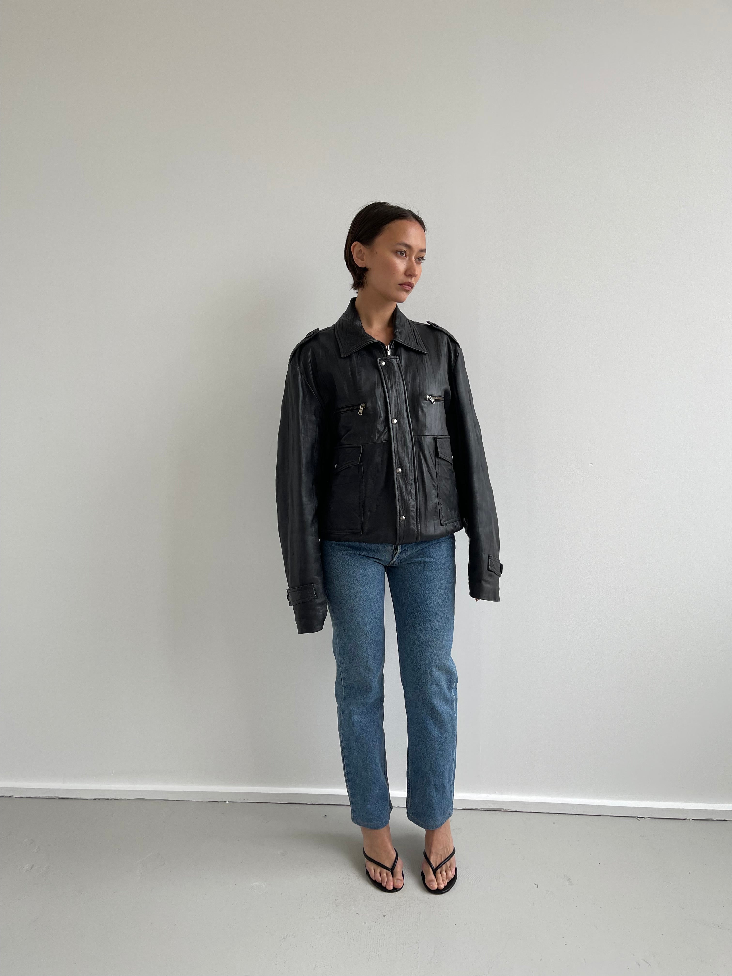 Oversized black leather bomber jacket