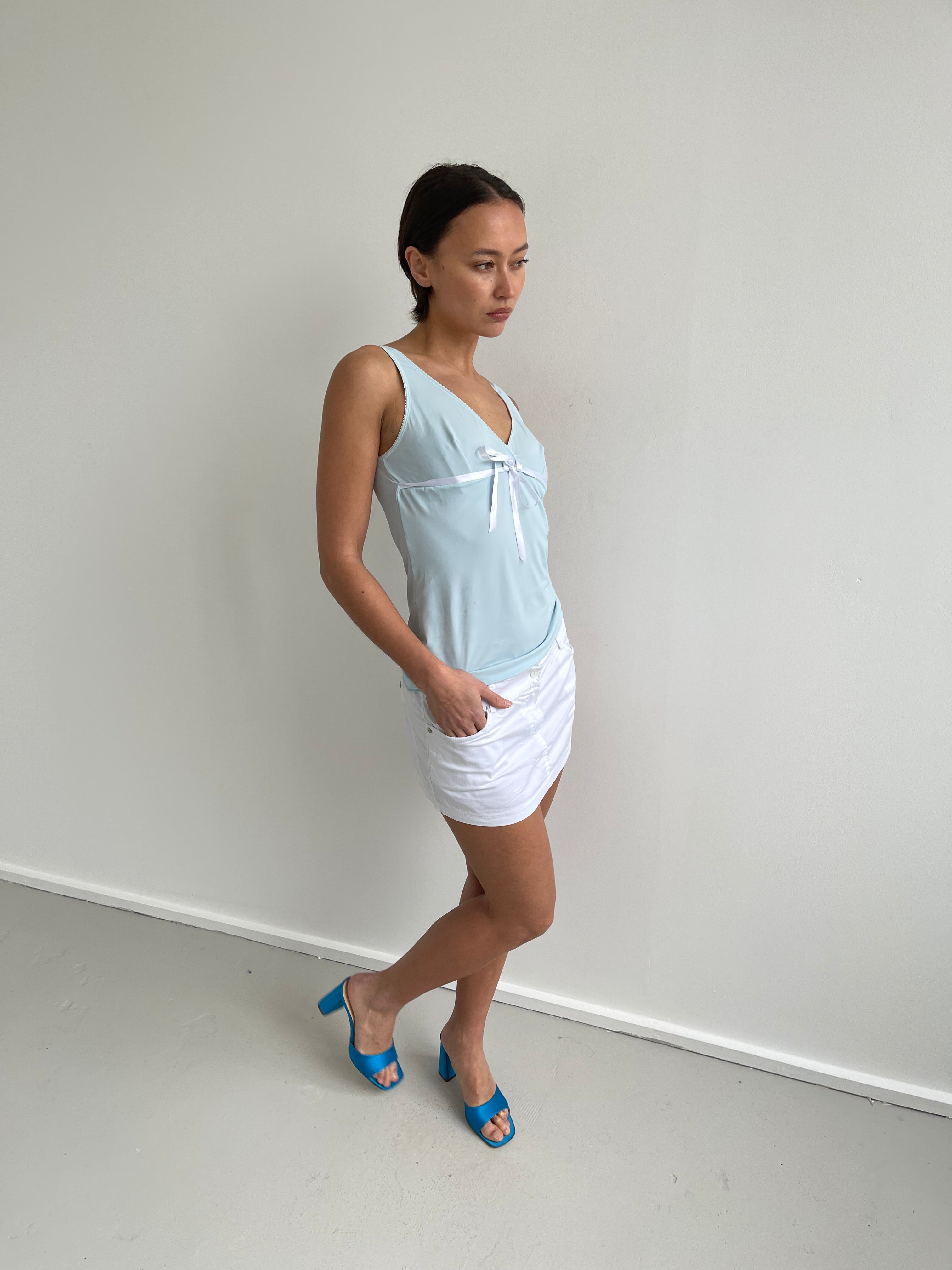 Baby blue cami top with white trims