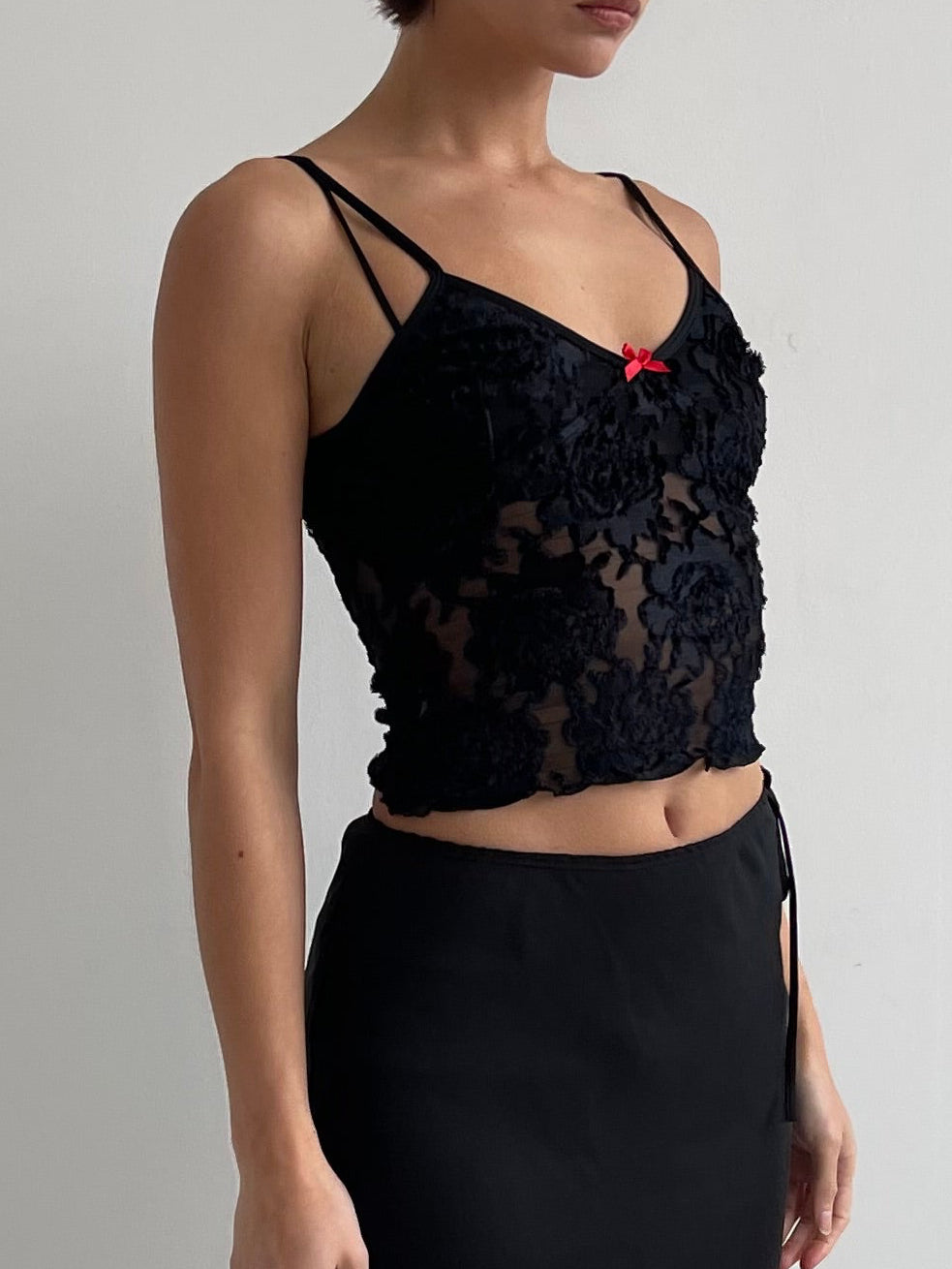 Black semi sheer cami top with red bow