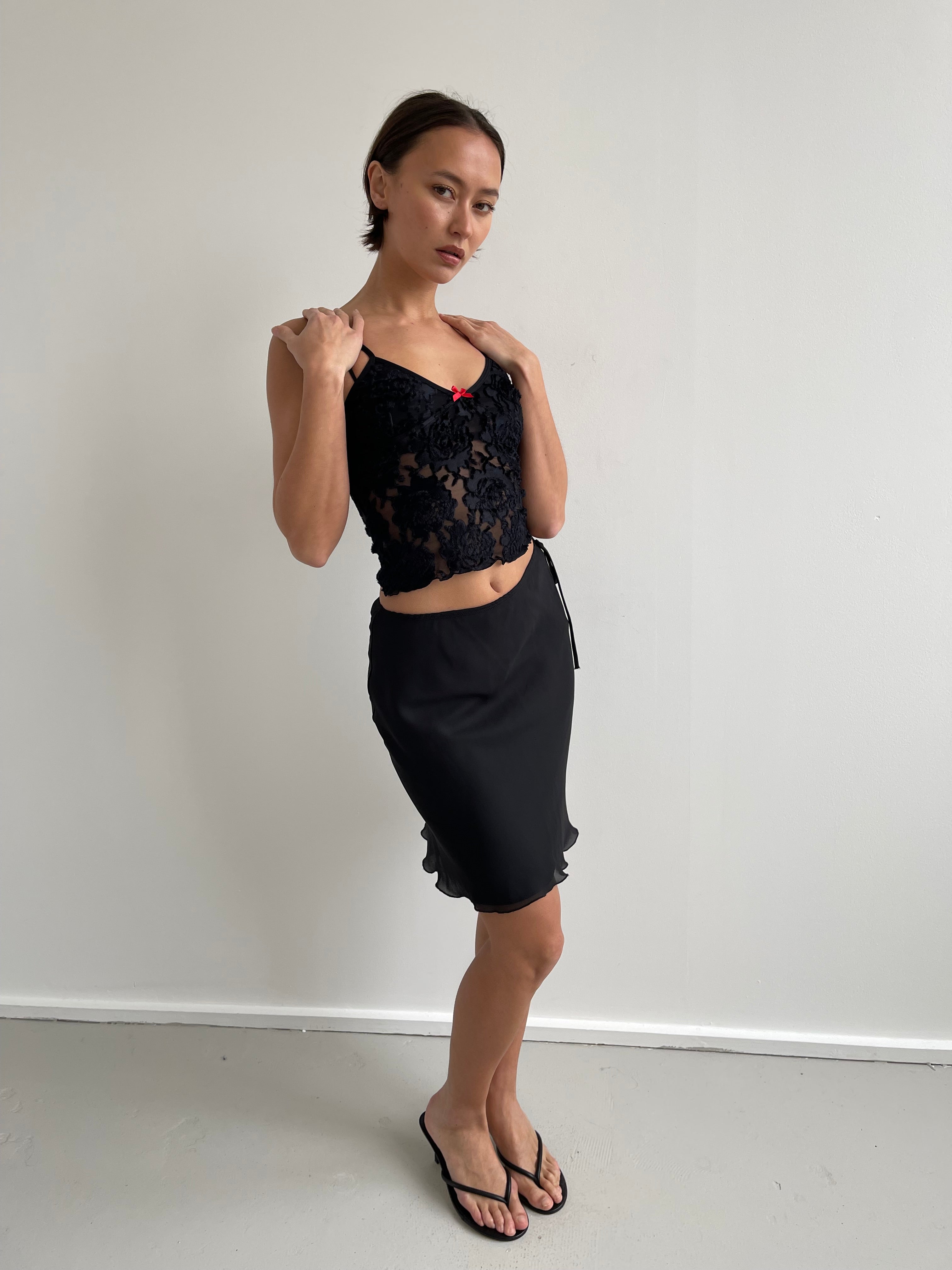 Black semi sheer cami top with red bow