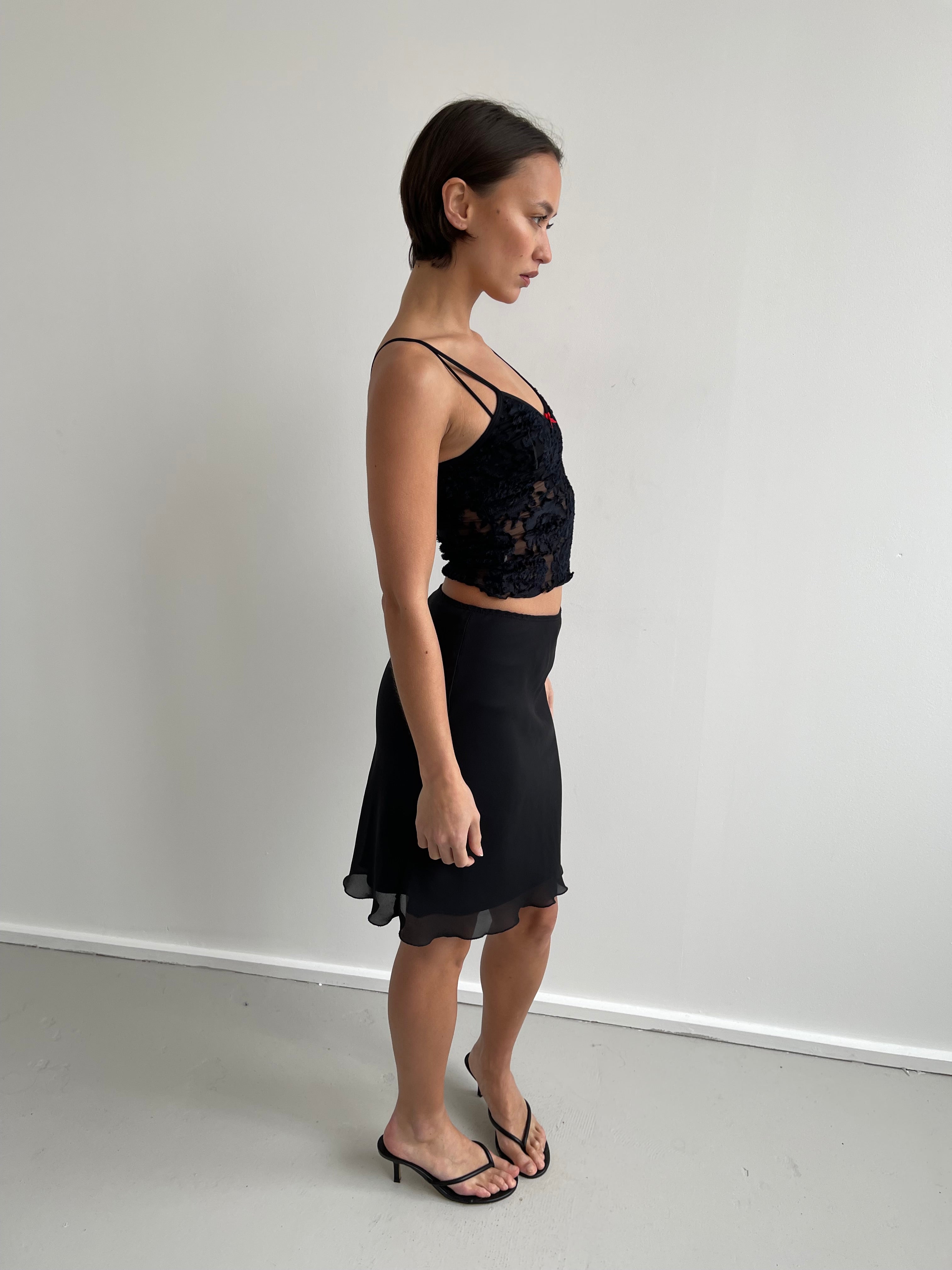 Black semi sheer cami top with red bow