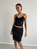 Black semi sheer cami top with red bow