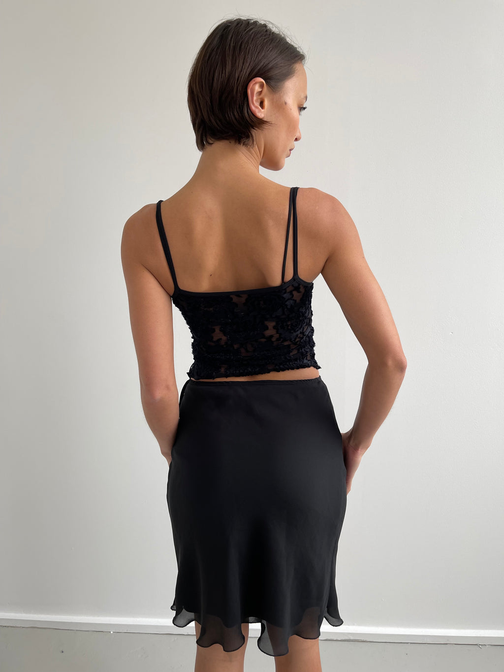 Black semi sheer cami top with red bow