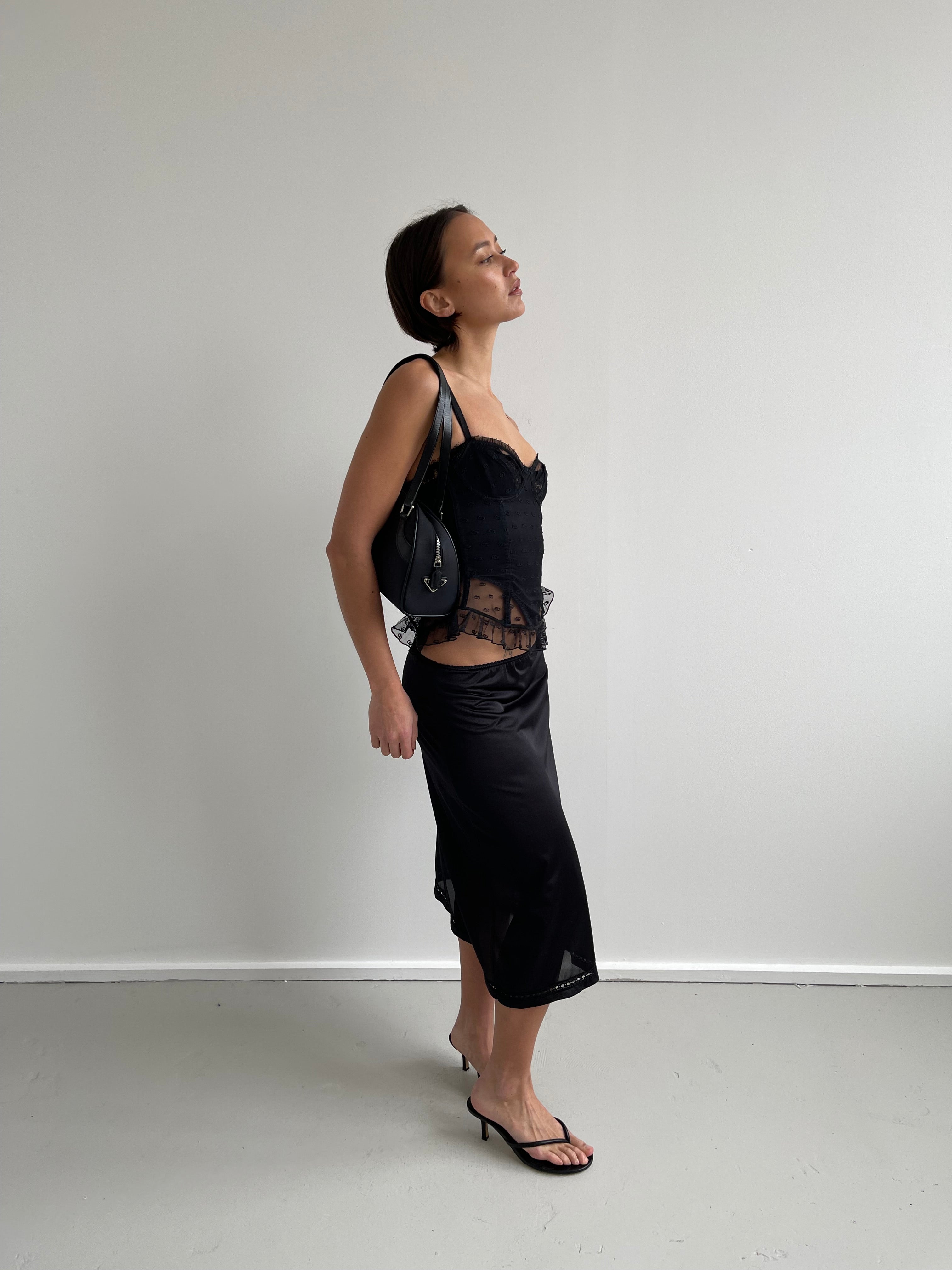 Black mesh corset top with embroidered detail