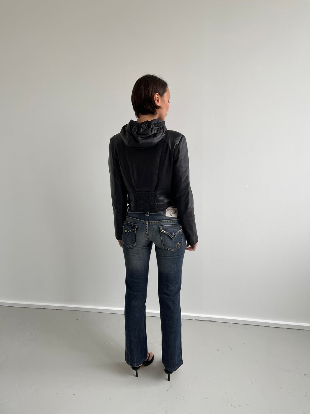 Vintage black leather jacket with hood