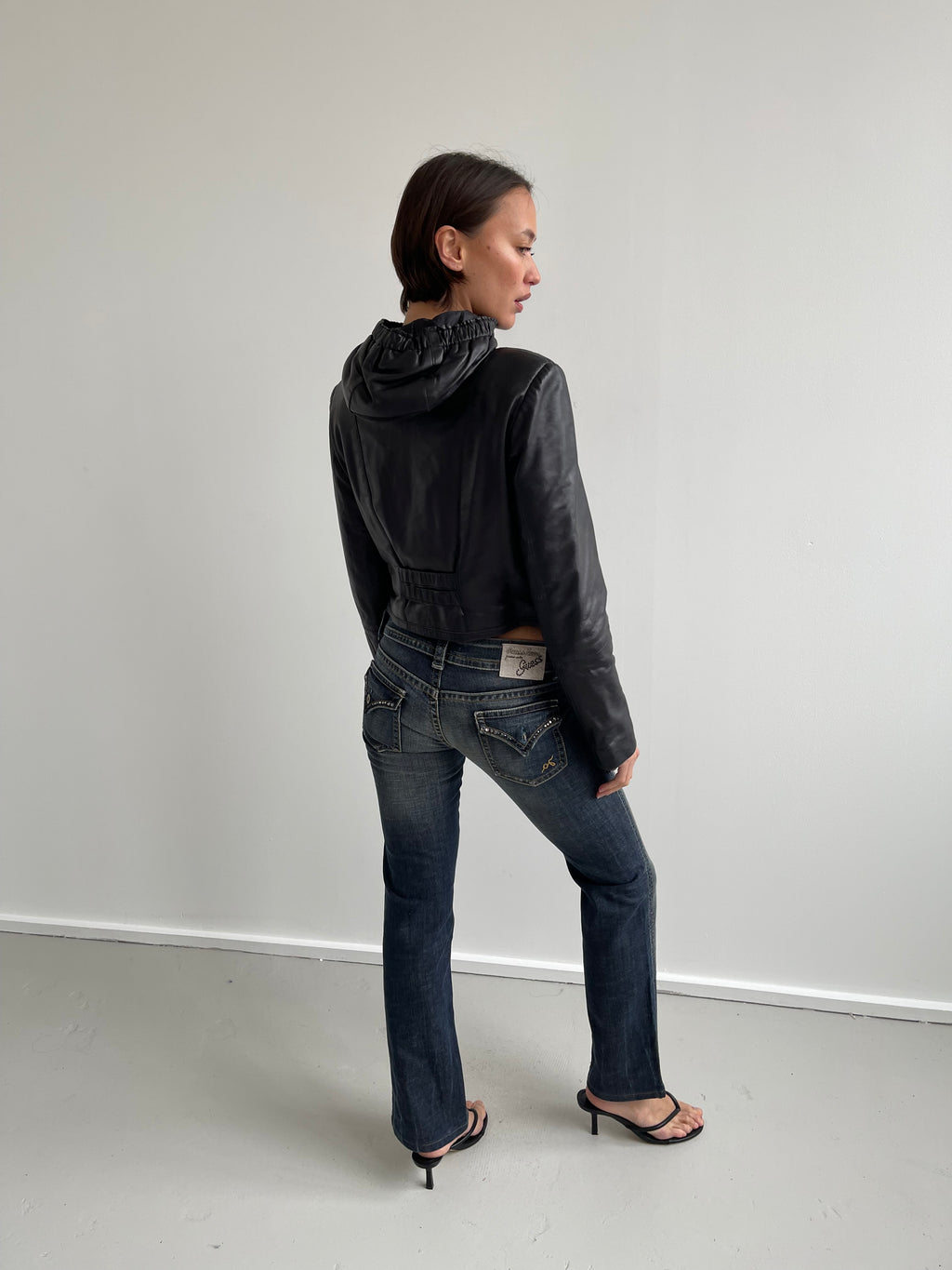 Vintage black leather jacket with hood
