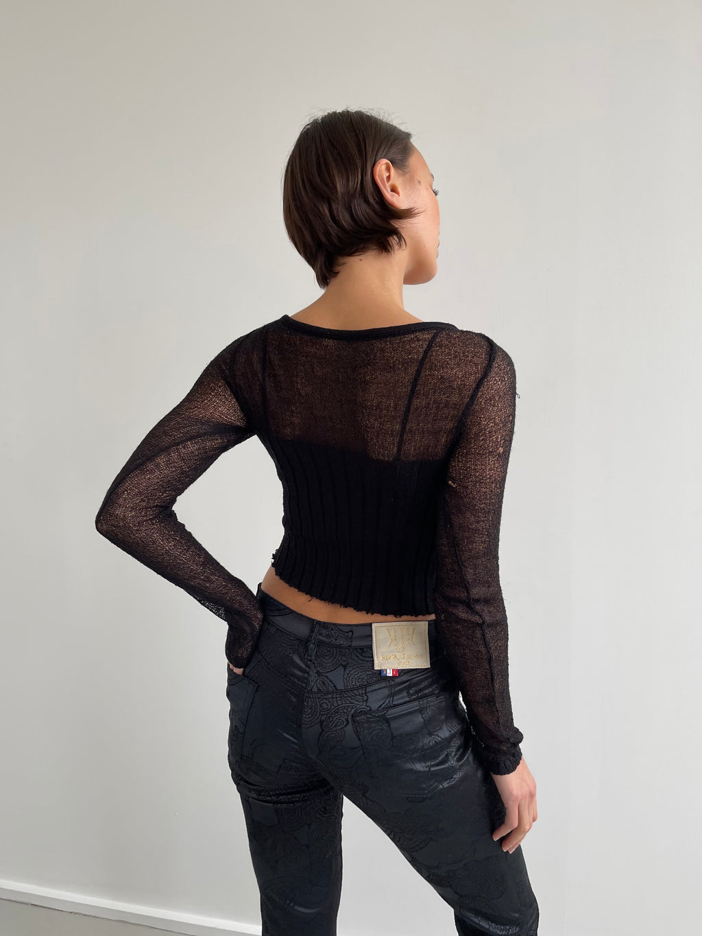 Black distressed fine knit top