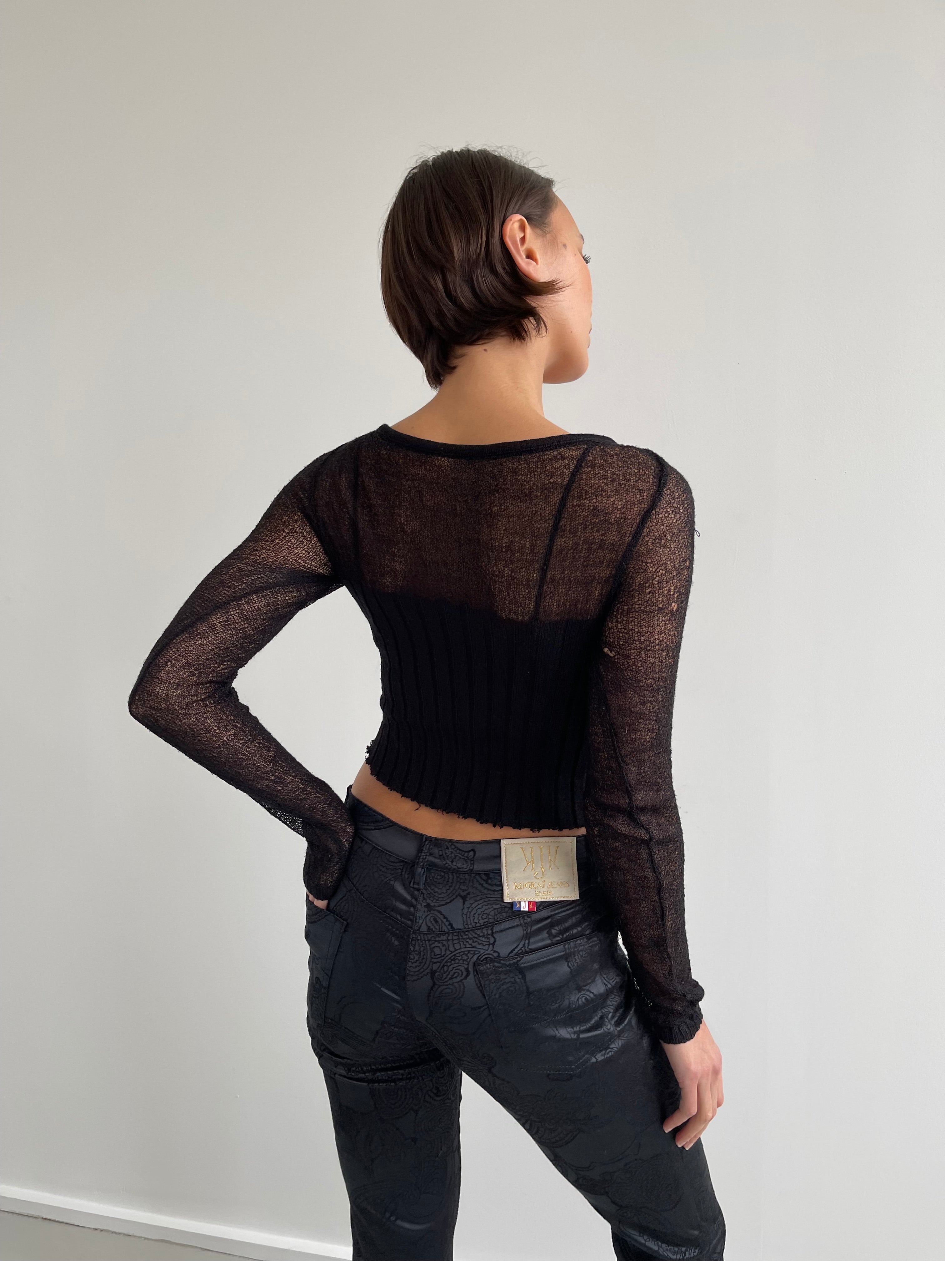Black distressed fine knit top
