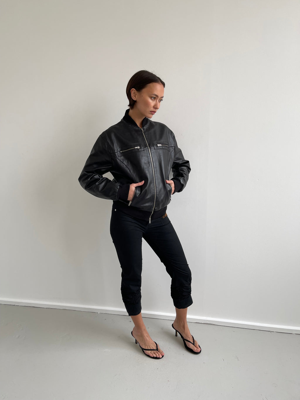 Black leather bomber jacket