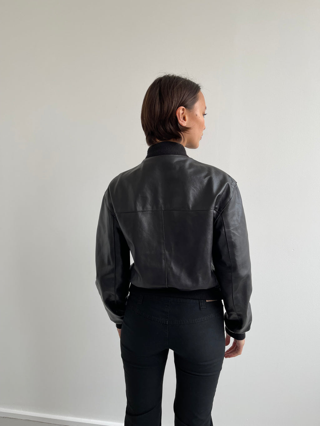 Black leather bomber jacket