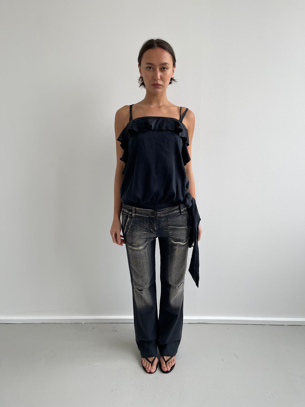 Black silk flowy blouse with ruffles and side tie