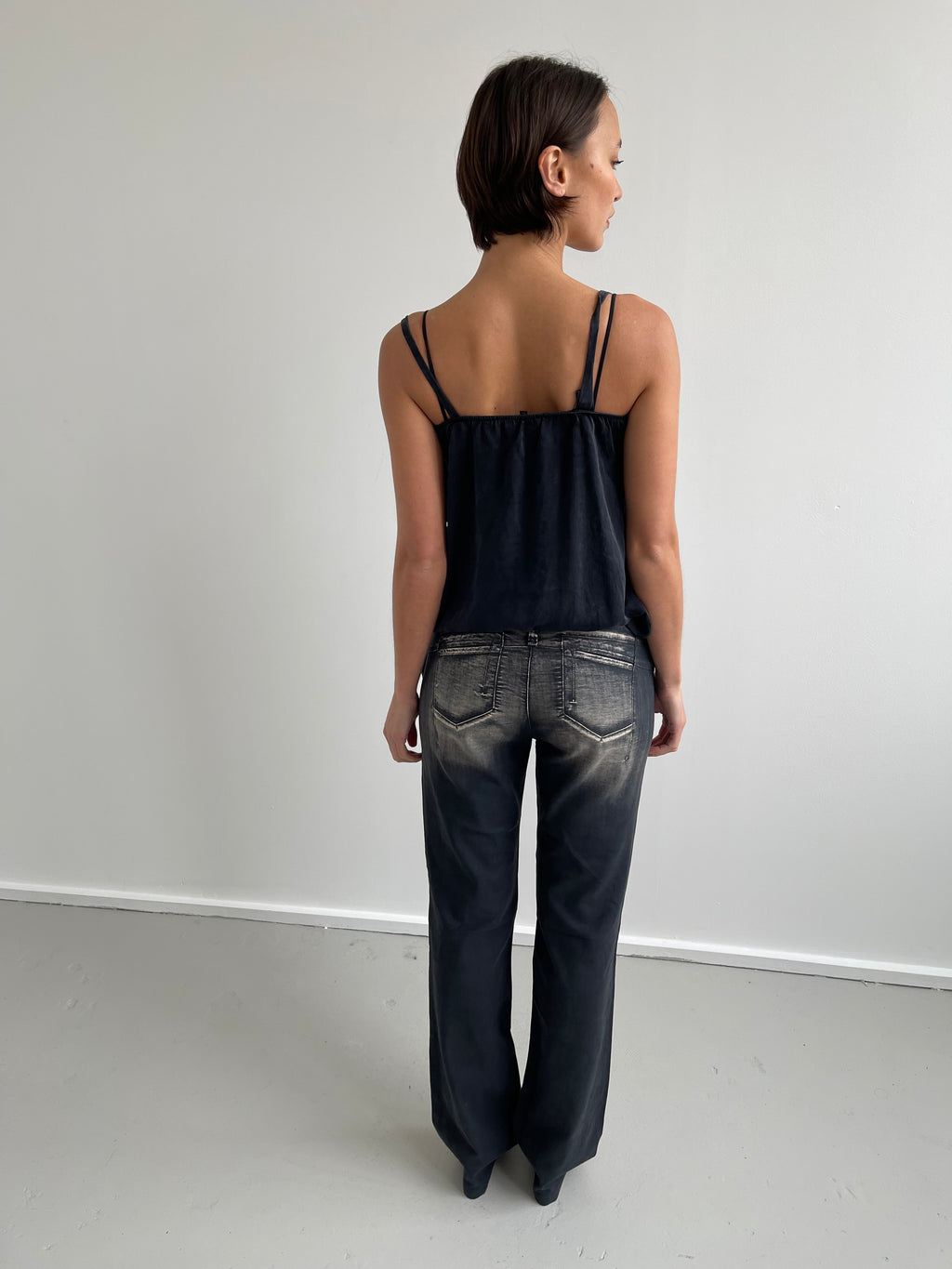 Black silk flowy blouse with ruffles and side tie