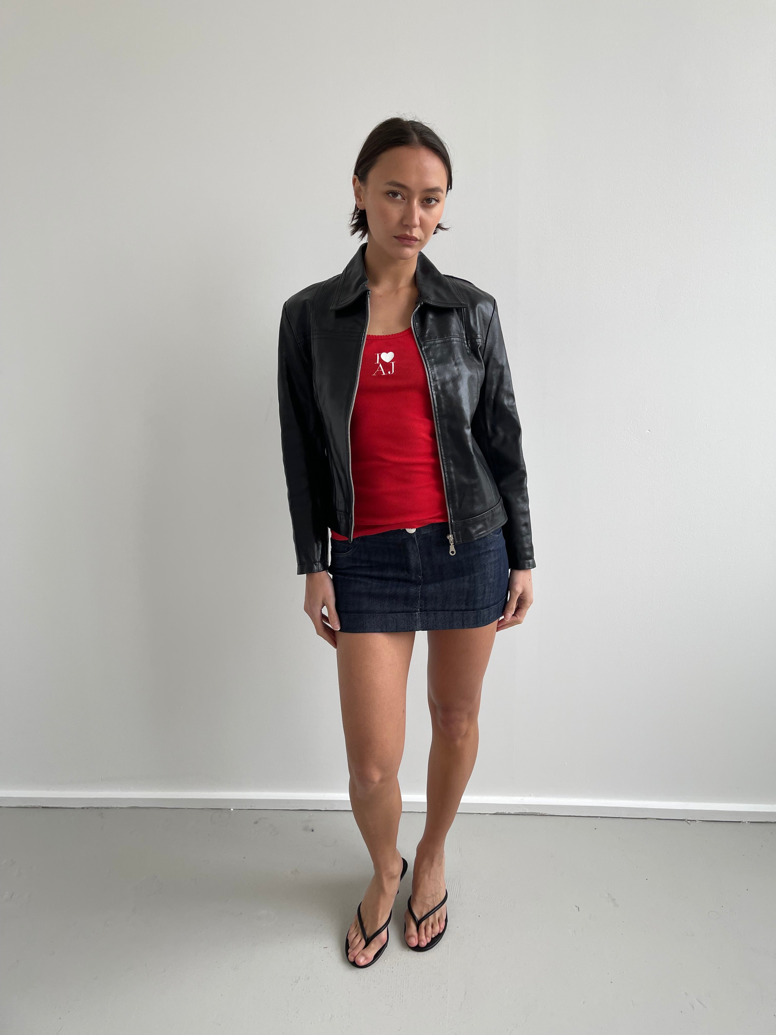 Black leather jacket with labelled detail