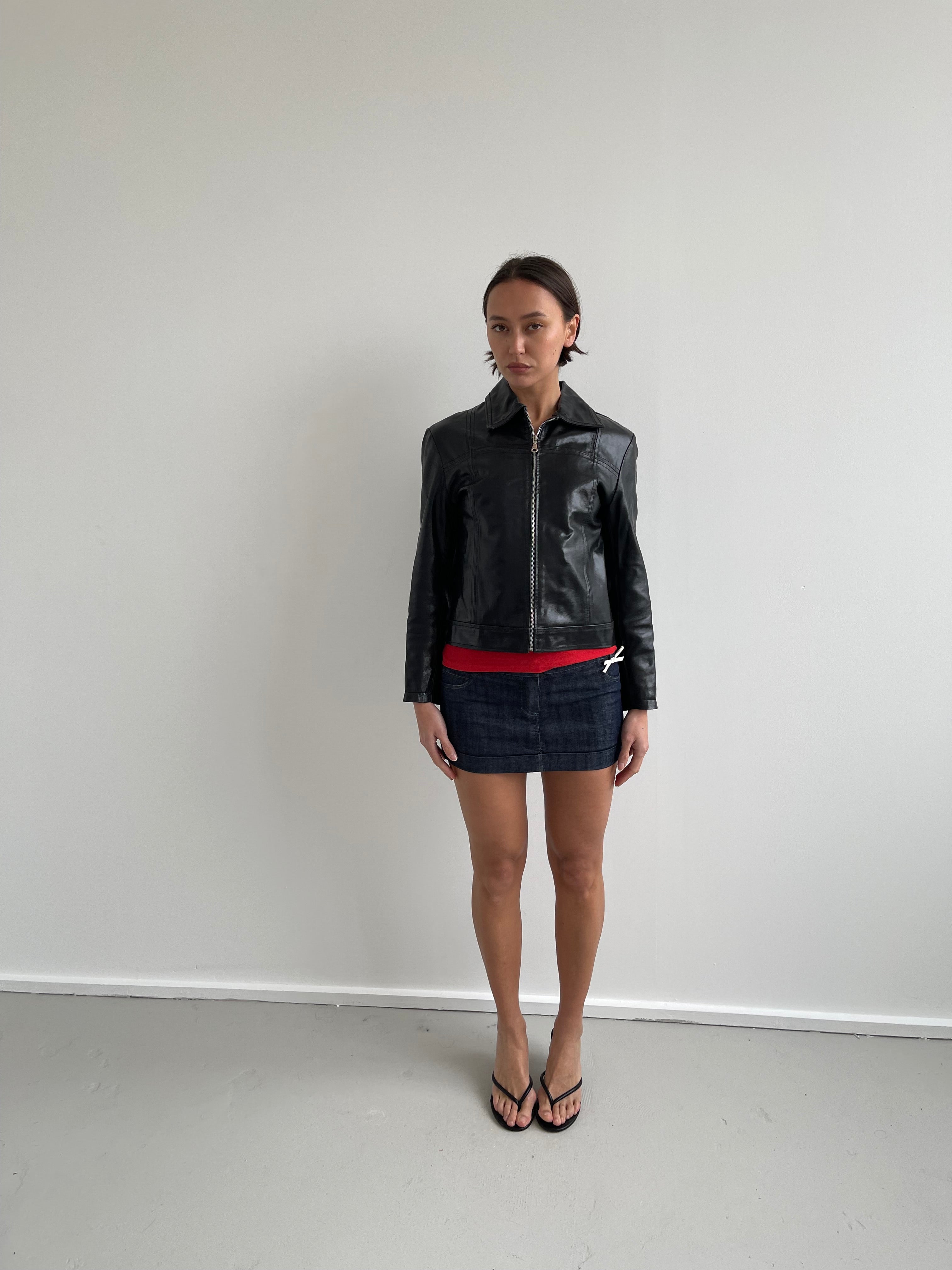 Black leather jacket with labelled detail