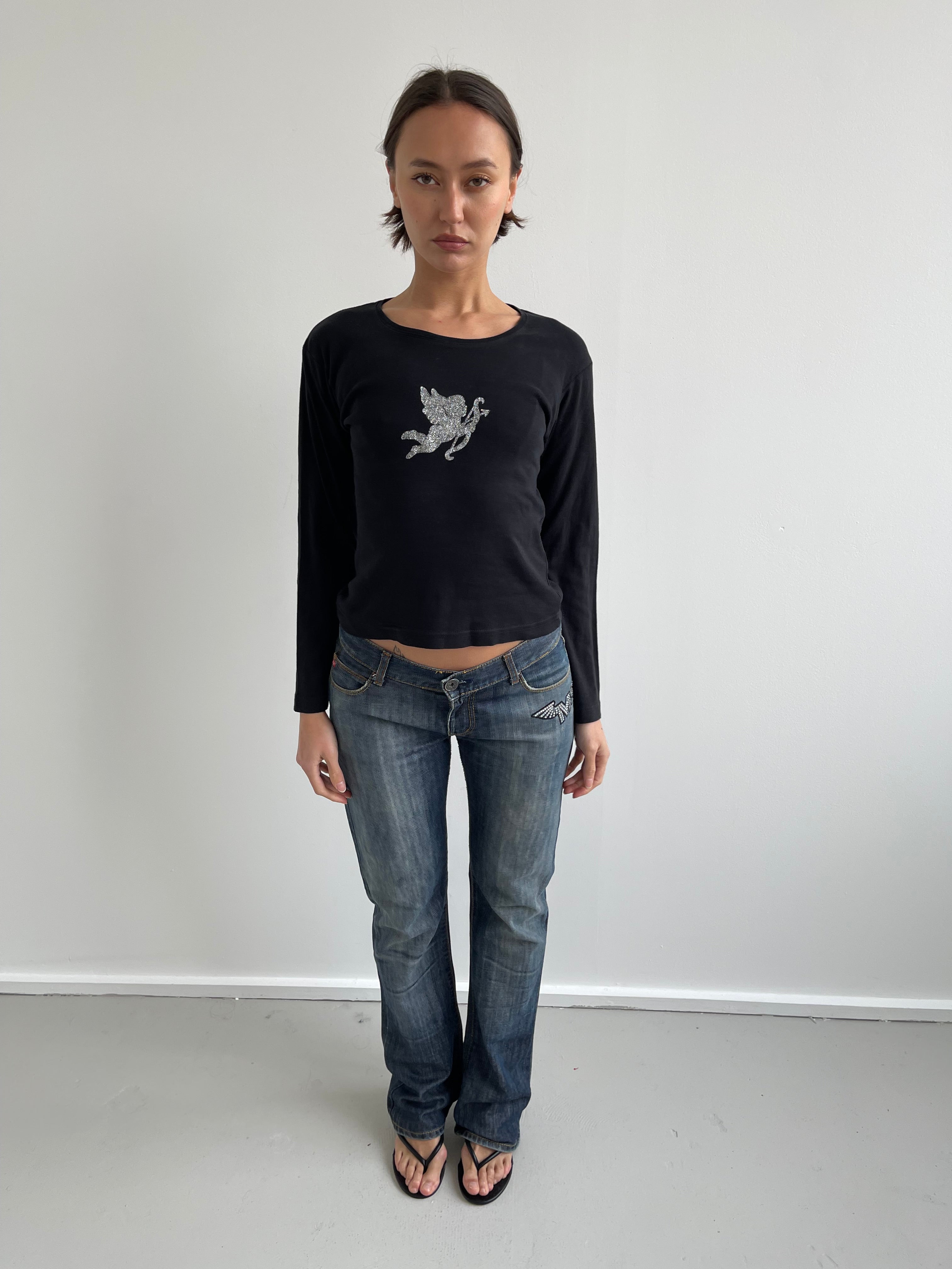 Black long sleeved top with silver cherub