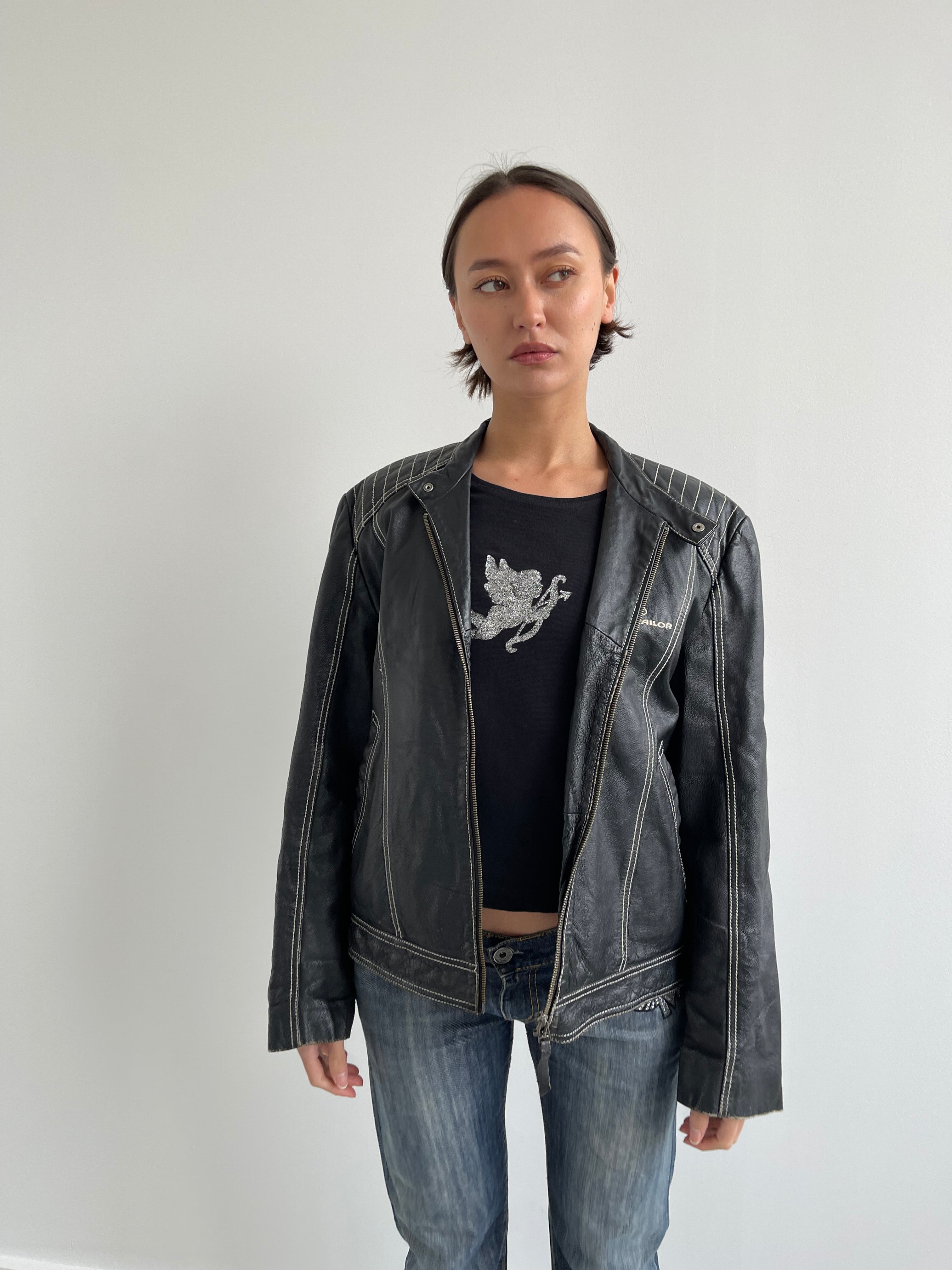 Vintage black leather biker jacket with cream top stitching