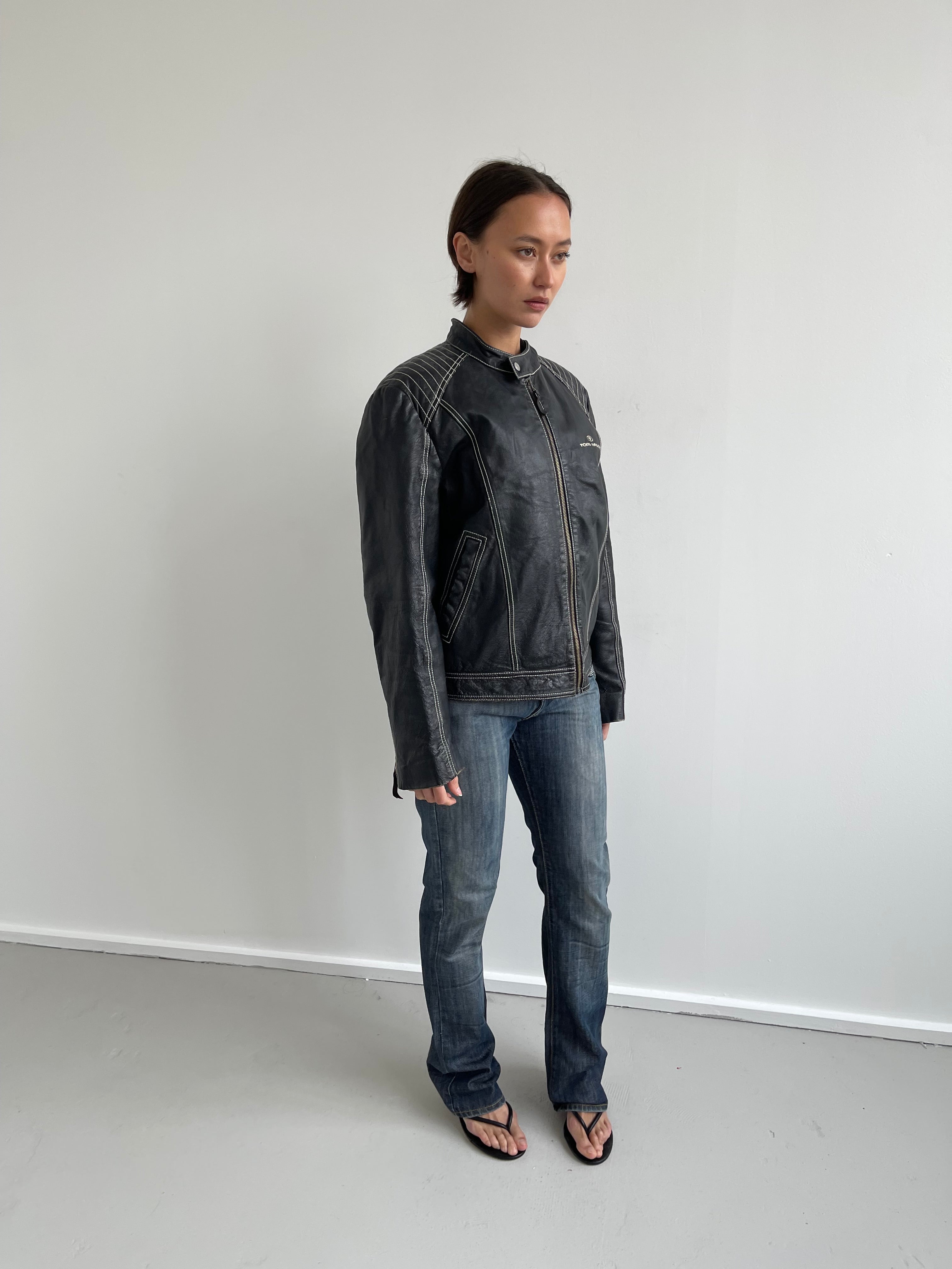 Vintage black leather biker jacket with cream top stitching