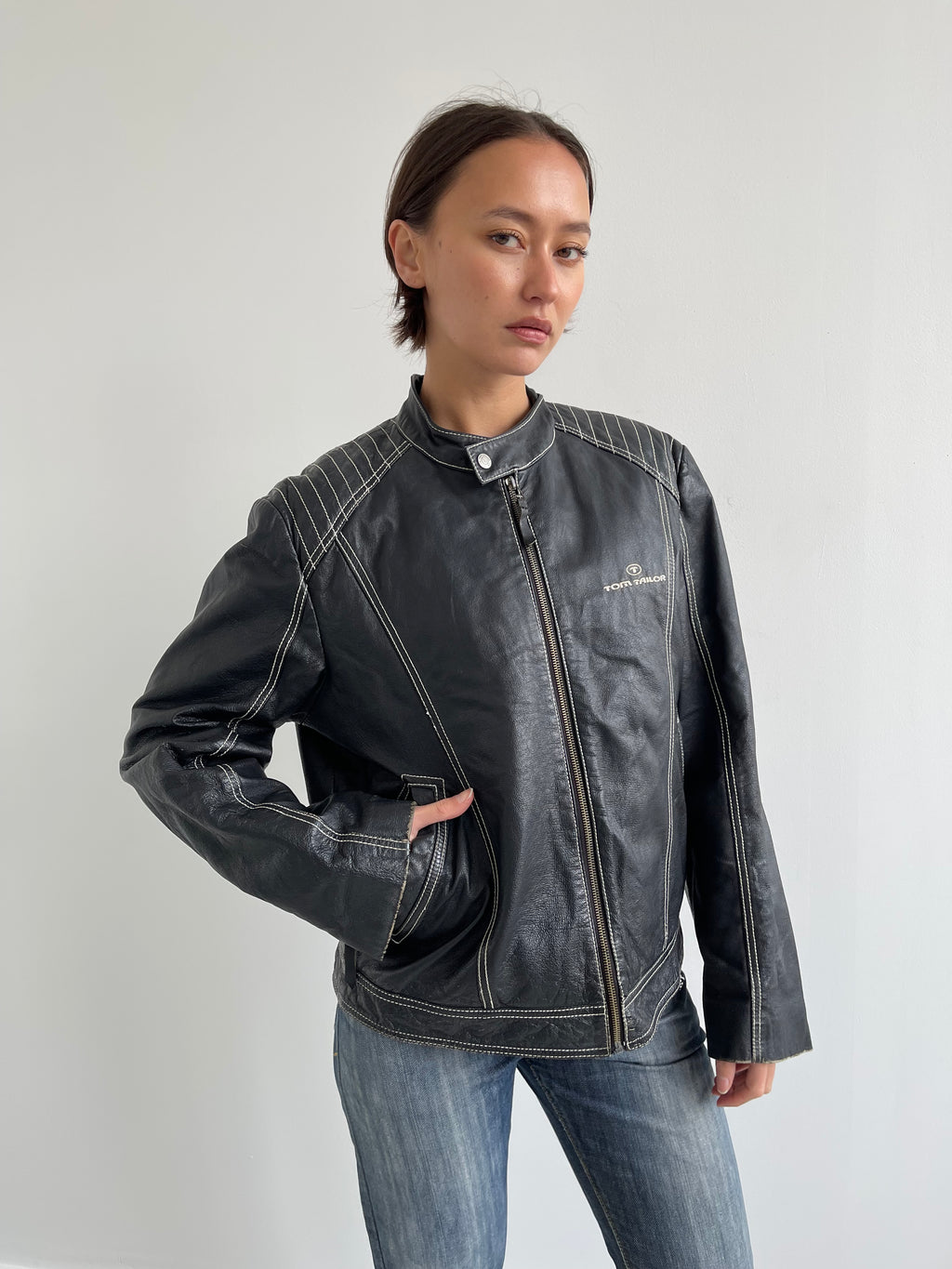 Vintage black leather biker jacket with cream top stitching