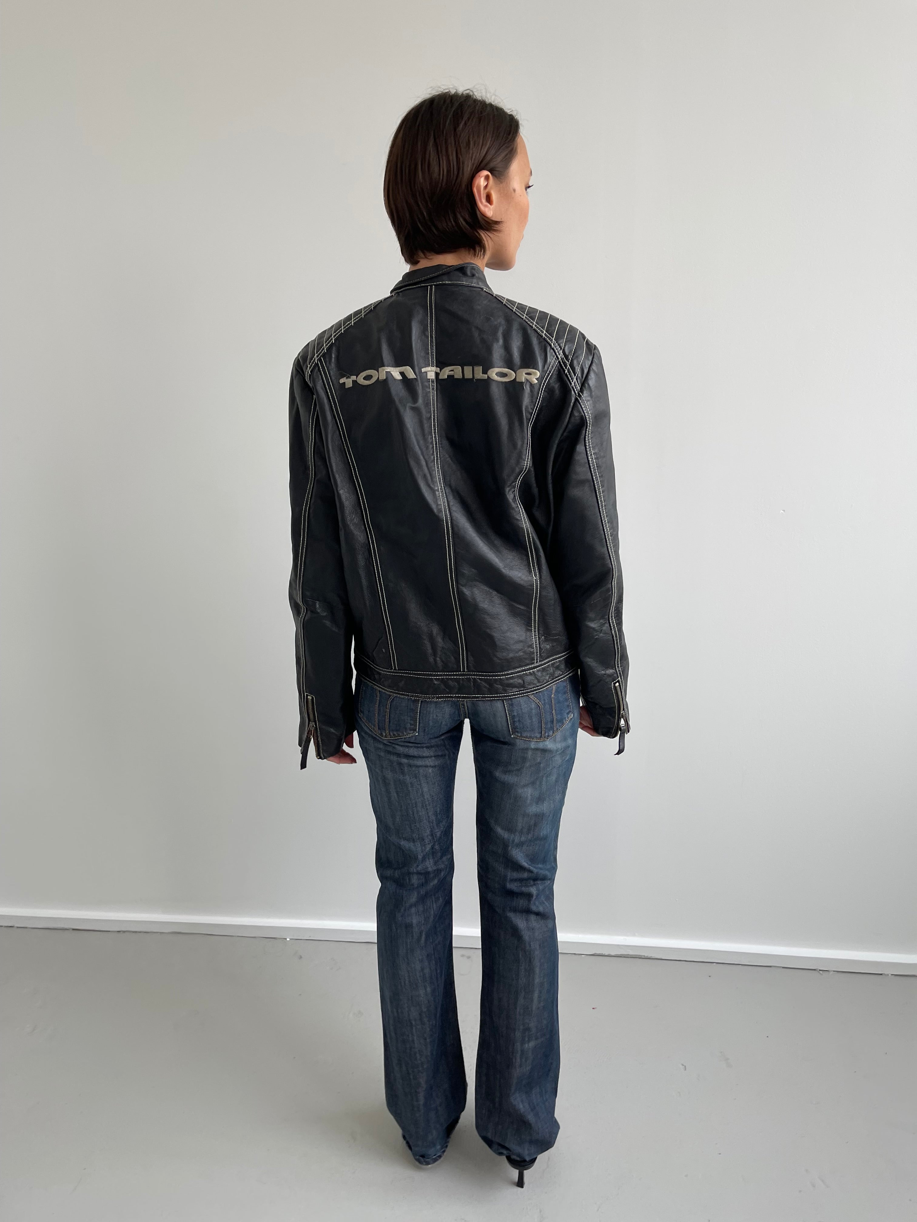 Vintage black leather biker jacket with cream top stitching