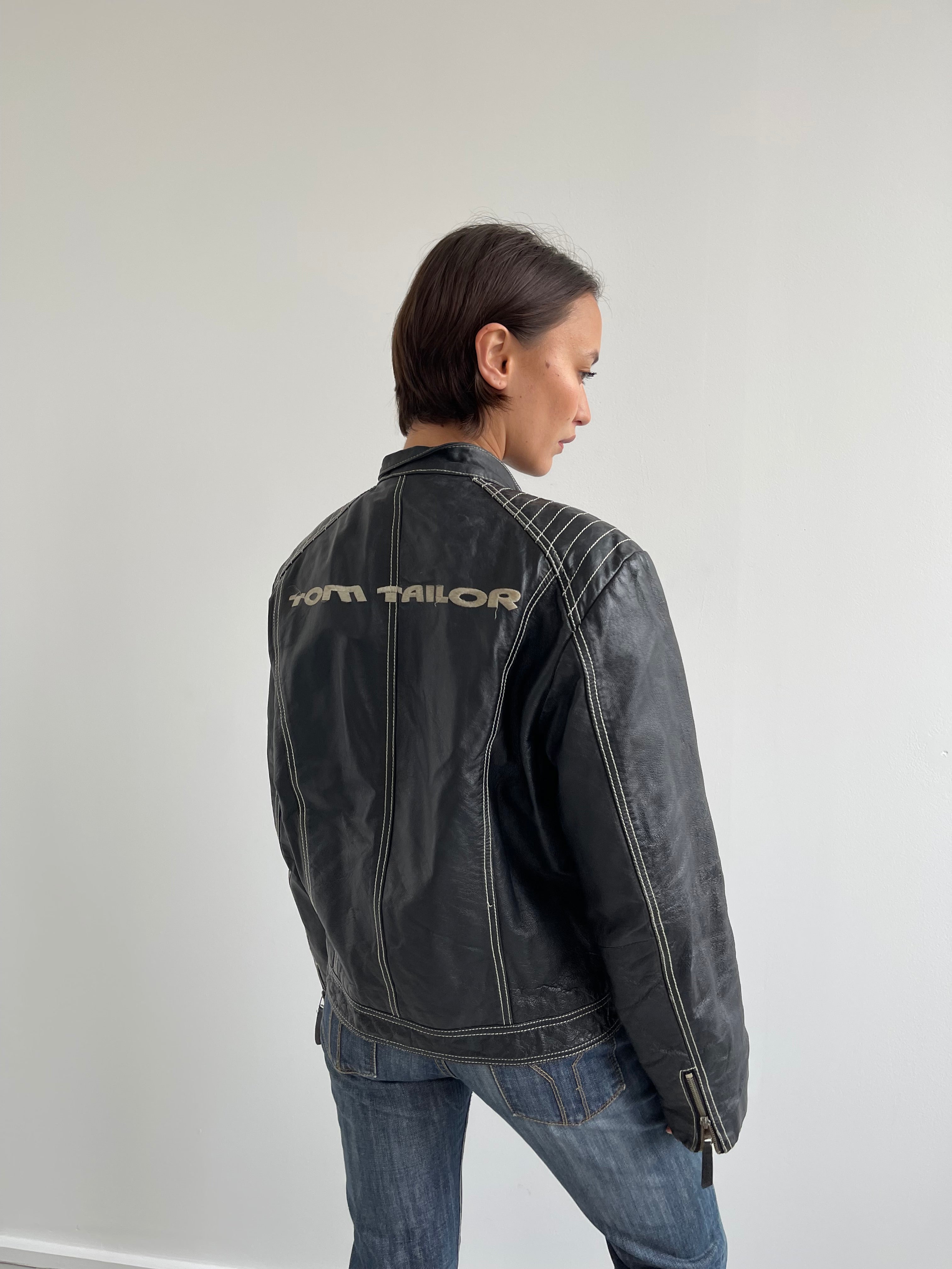 Vintage black leather biker jacket with cream top stitching