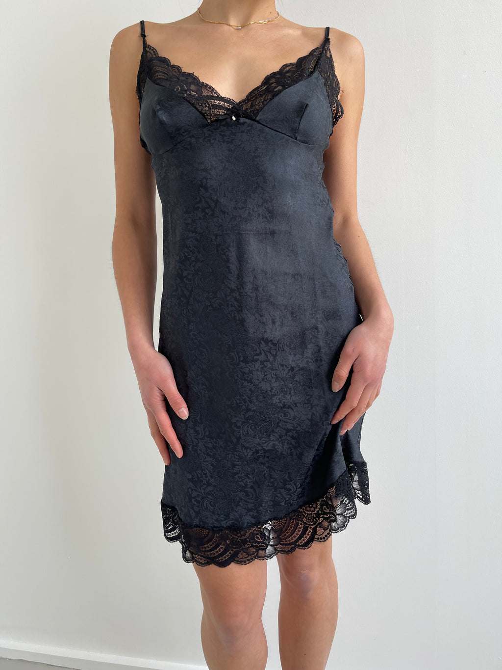 Navy and black slip dress with paisley design and lace trim