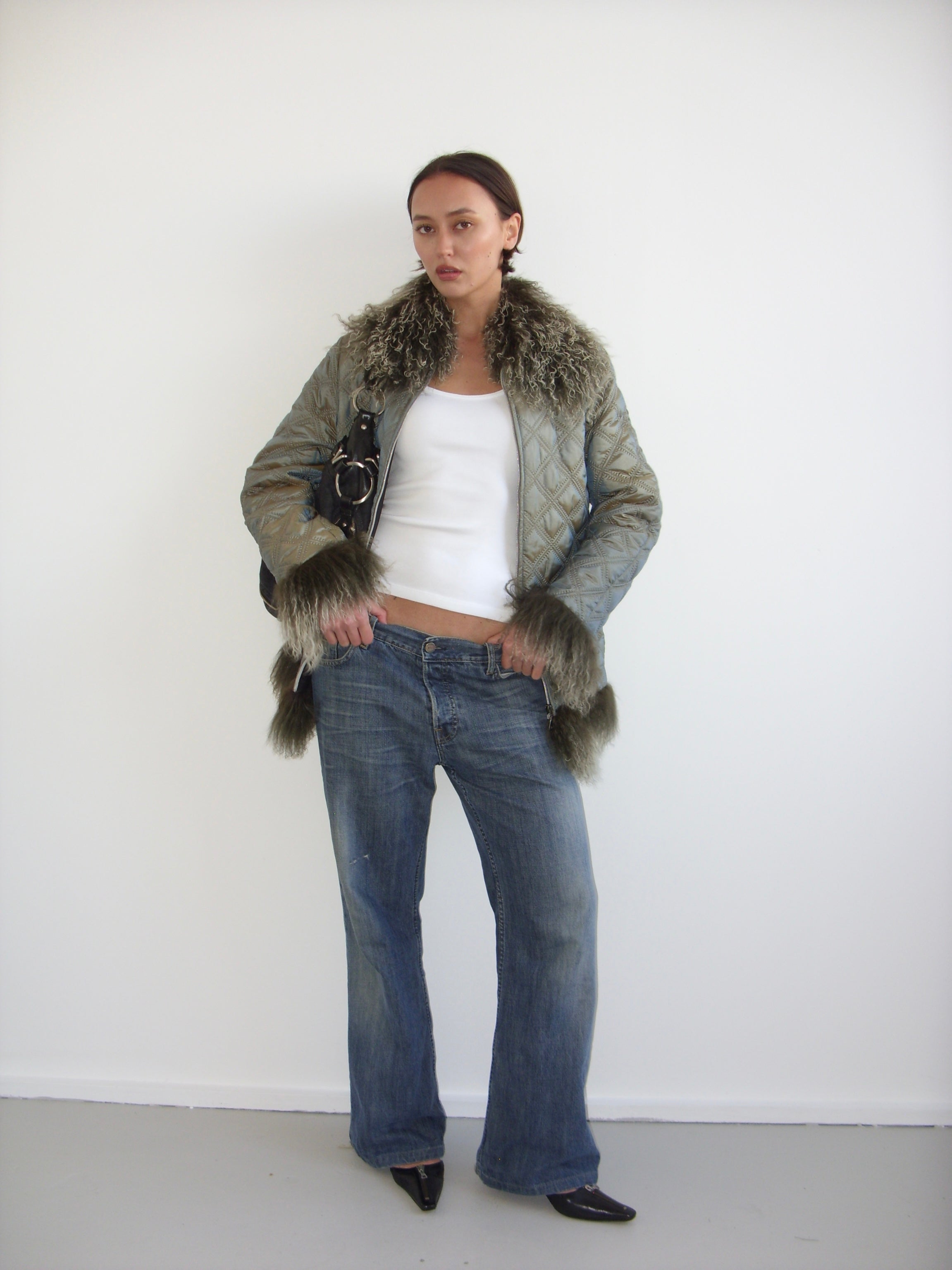 Iridescent quilted afghan coat