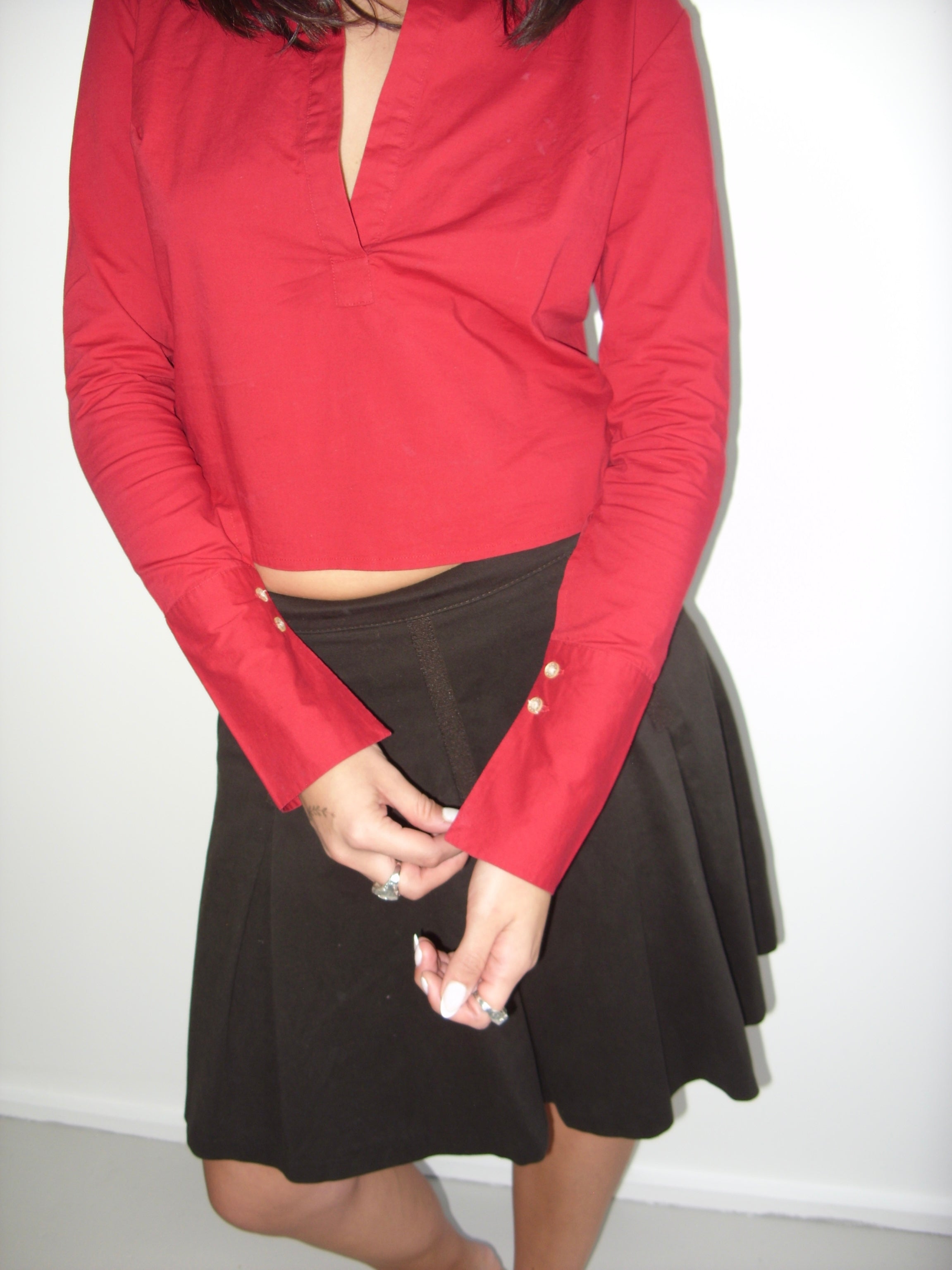 Red pull over shirt