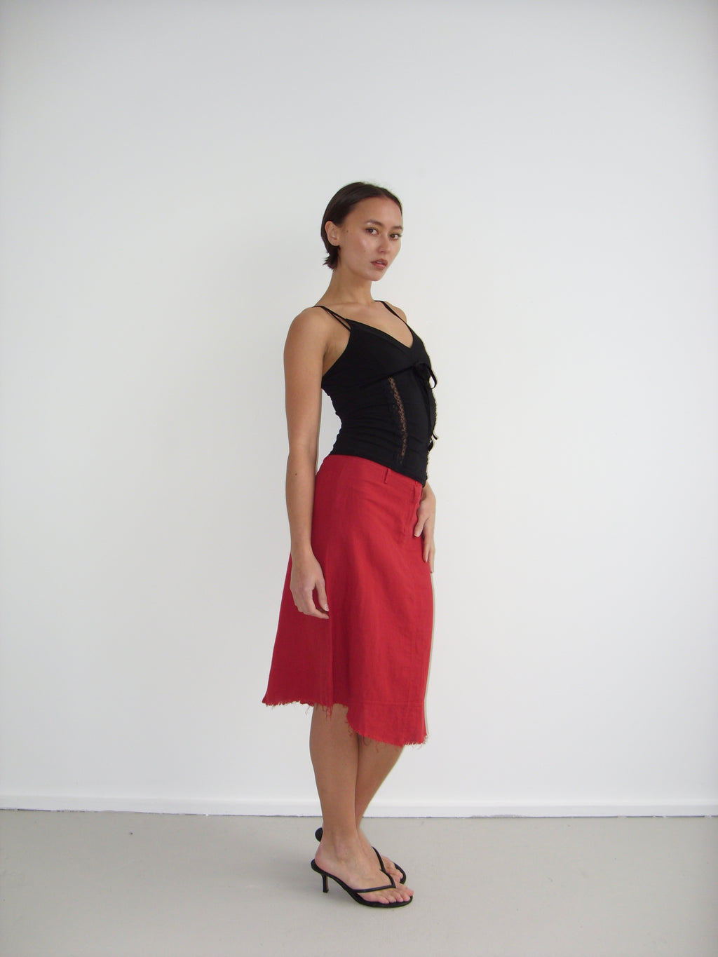 Black cami top with sheer lace panels